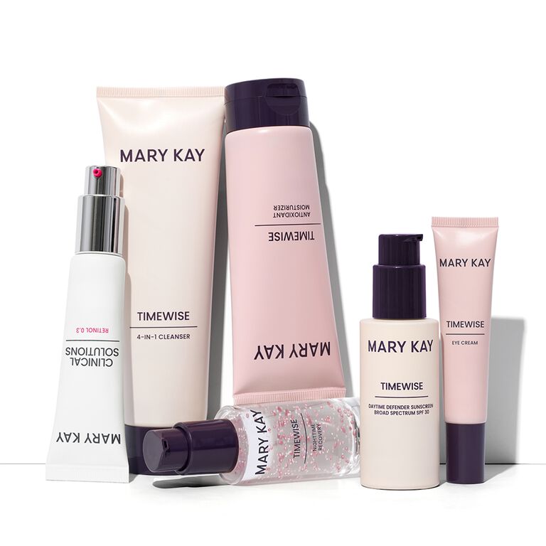 Mary Kay TimeWise skincare products including cleanser, moisturizer, eye cream, and sunscreen grouped together.